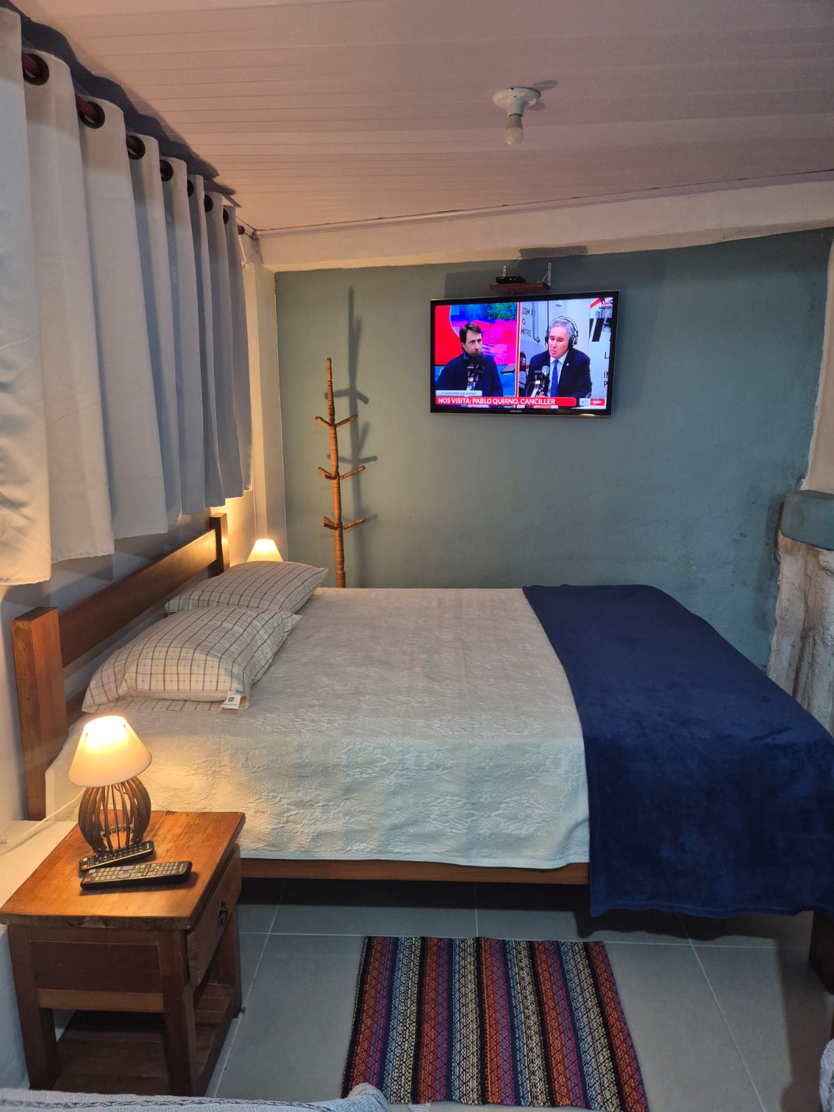 Quarto principal com TV